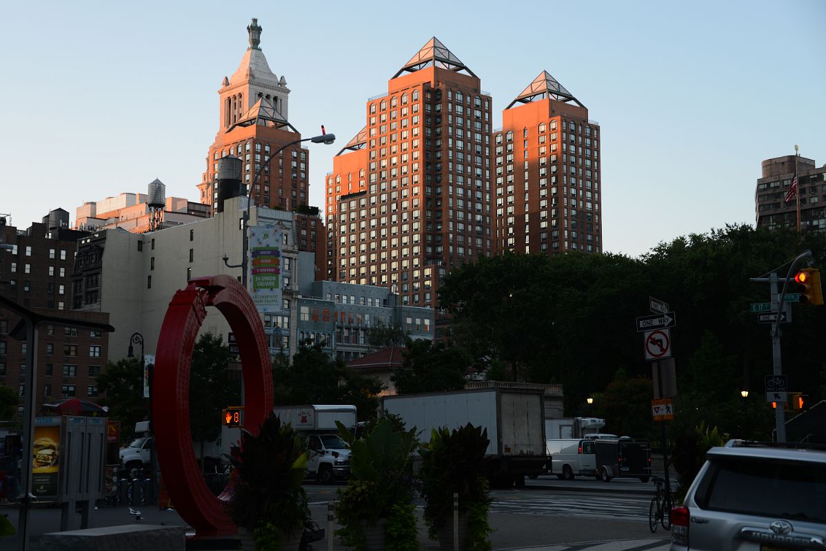 07-2 Red Sculpture At the North End of the Park With Zeckendorf Towers And Con Edison Building In Union Square Park New York City